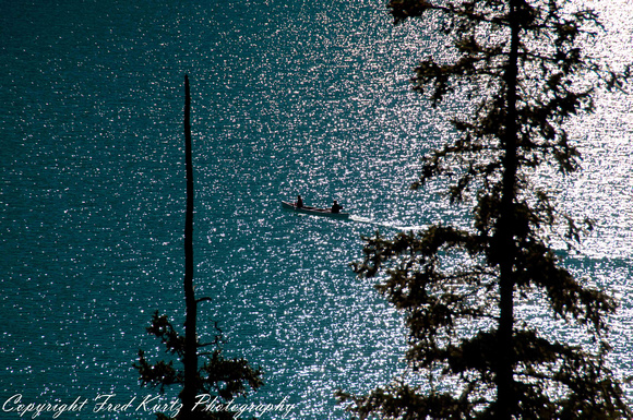 Evening light.  Canoeing on Moraine Lake in Banff NP. Alberta.
